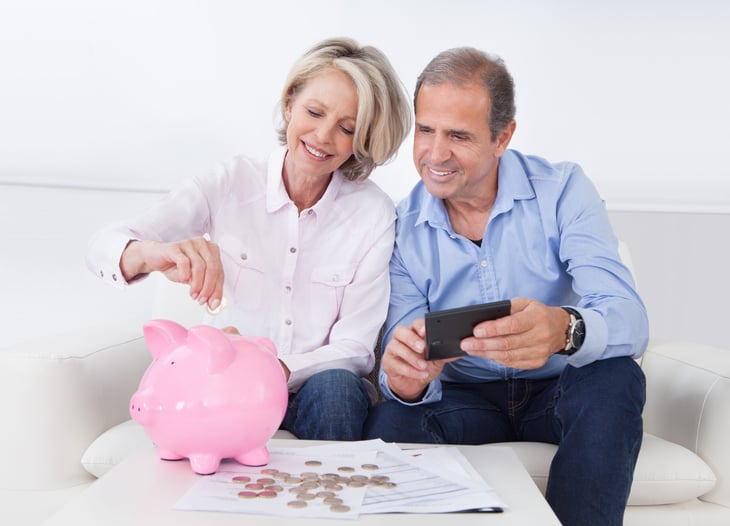 Older couple saving money for retirement
