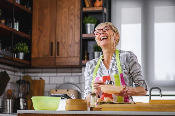 Senior cooking at home