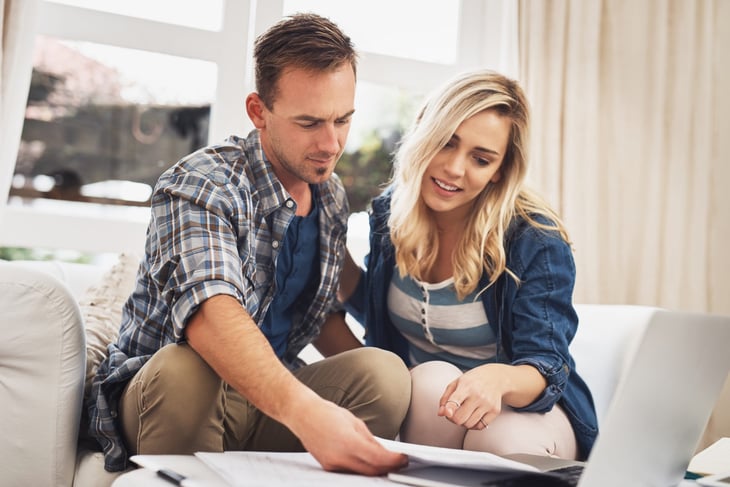 Couple looking at their credit score