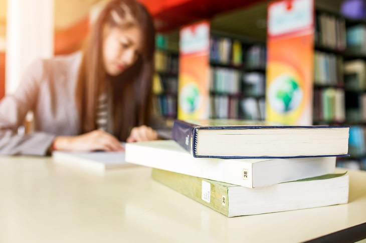 College student in library