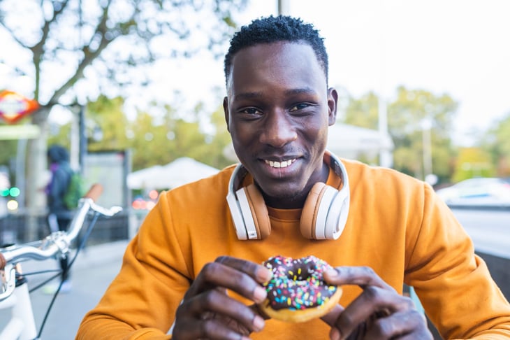 Man eating a doughnut