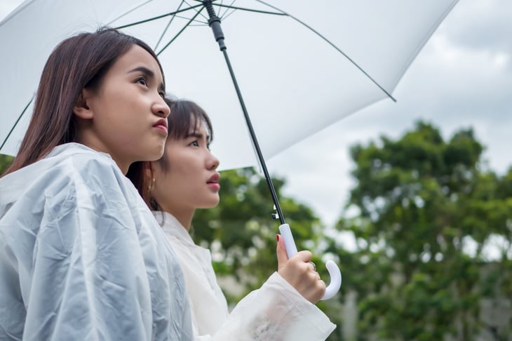 Unhappy women on a cloudy day