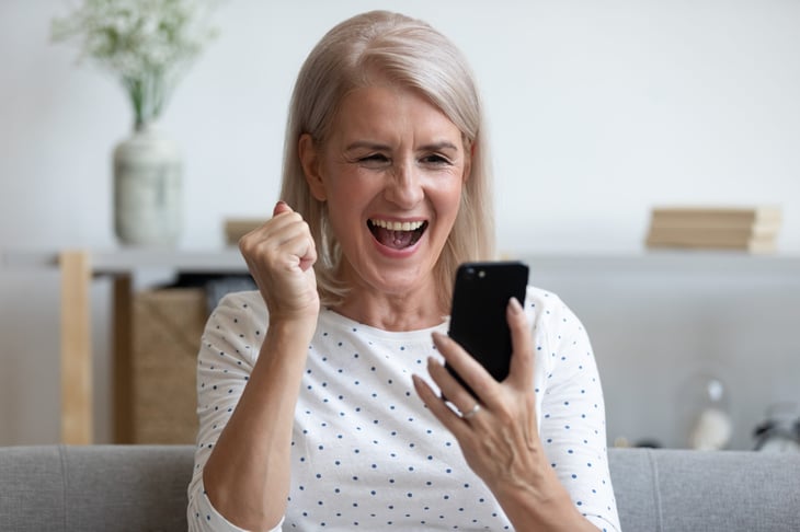 Woman excited about her new phone plan