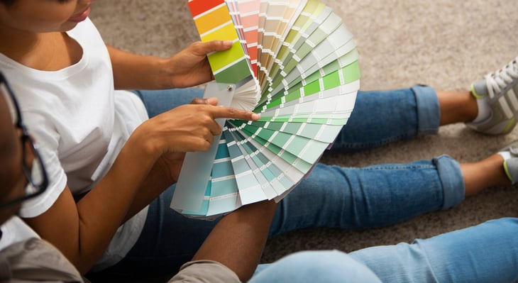 Couple picking a paint color for their home
