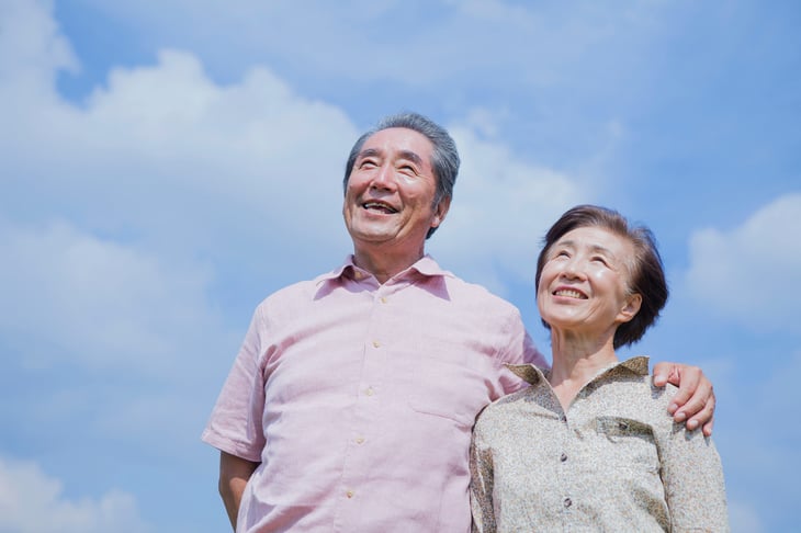 Senior couple under blue skies