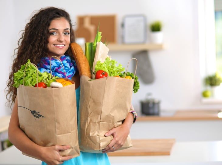 Woman holding grocery bags