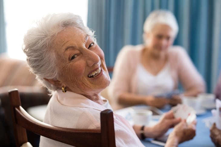 Senior playing cards at a nursing home