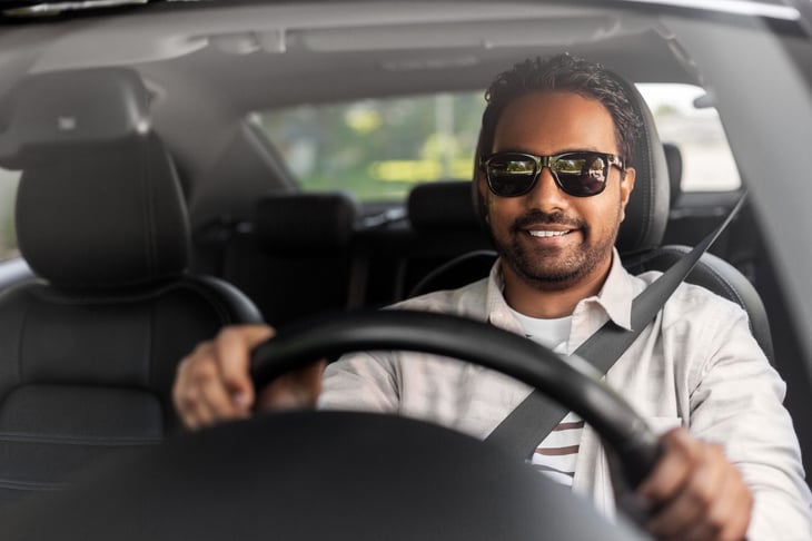 Man driving his car