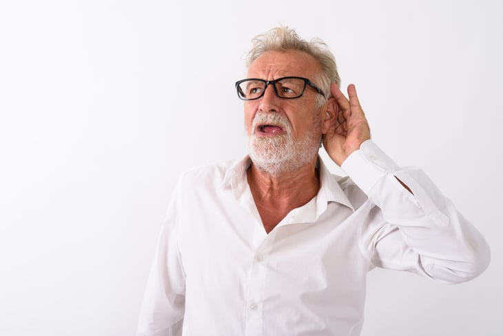 Senior man listening carefully