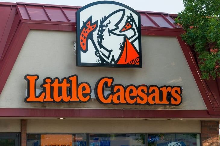 Little Caesars pizza restaurant exterior and trademark logo.