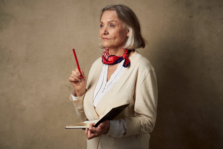Older woman writing