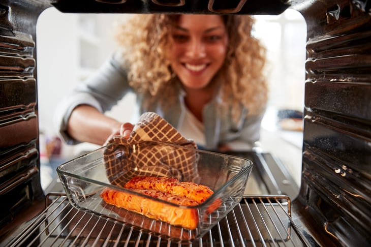 Woman using her oven
