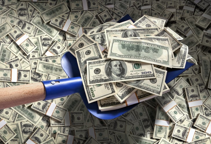 Shoveling a pile of money