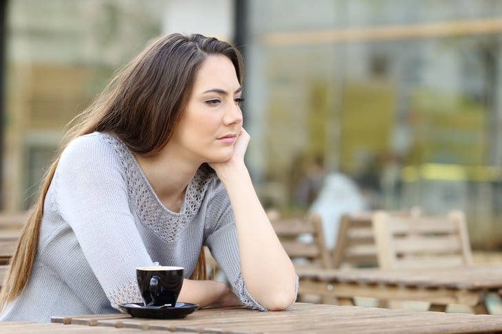 Worried woman waiting at a restaurant