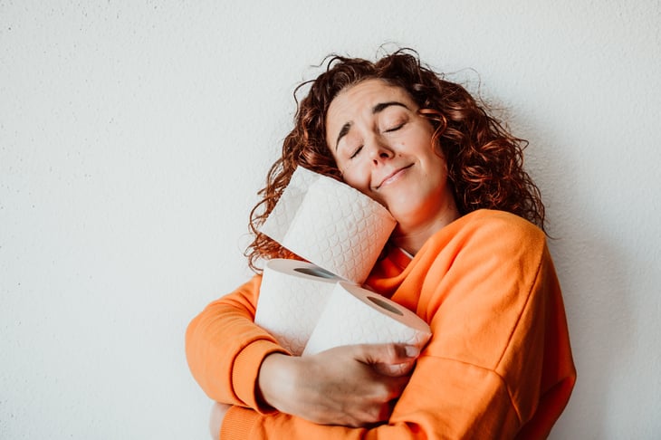 Woman with toilet paper