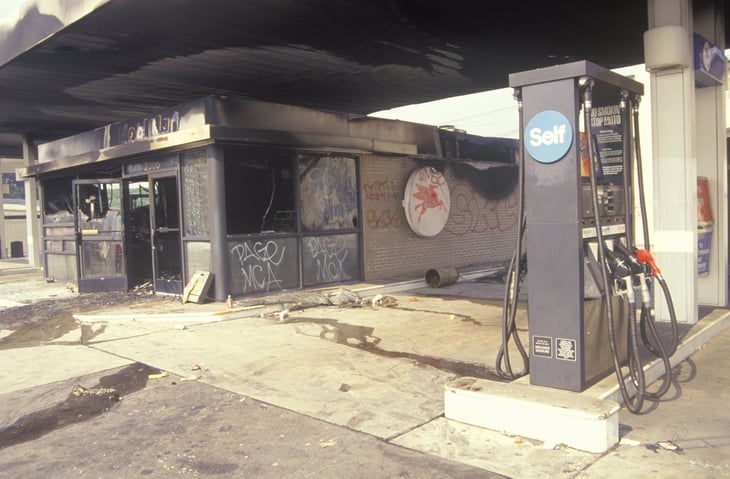 Gas station damaged during riots in Los Angeles in 1992