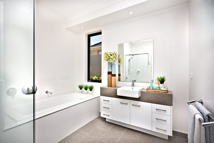 A fancy, renovated bathroom.