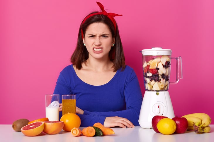 Woman unhappy with her food processor