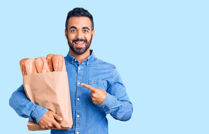 man with bag of bread