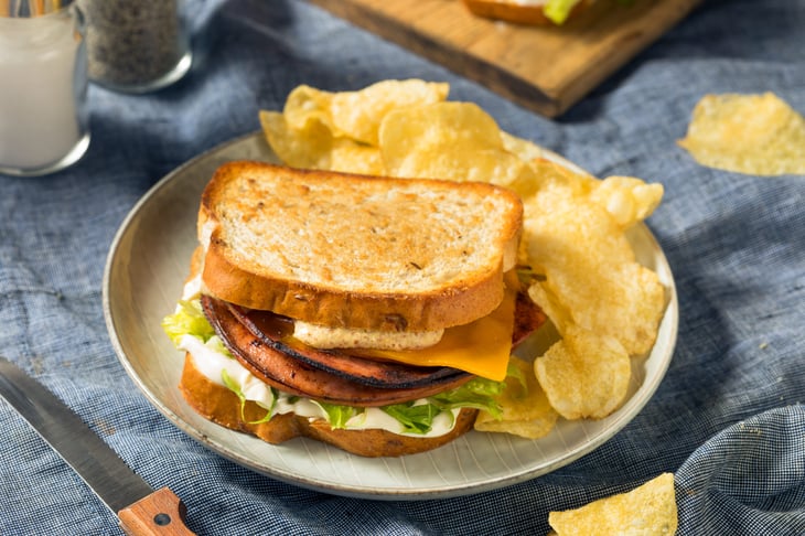Fried bologna sandwich and chips