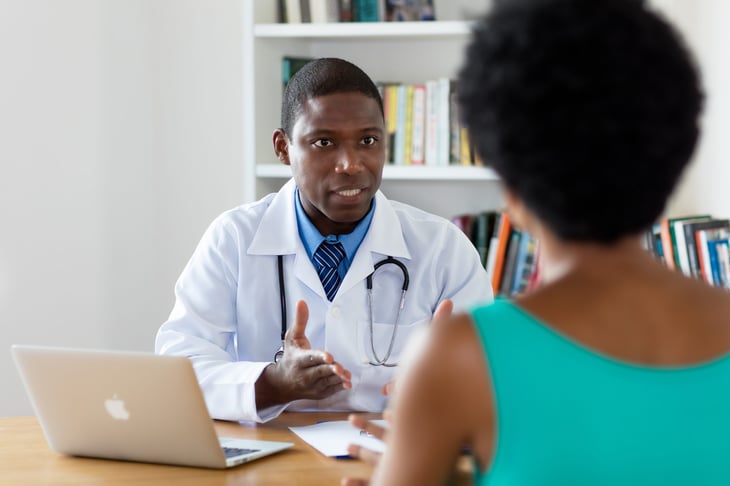 Doctor talking to a patient