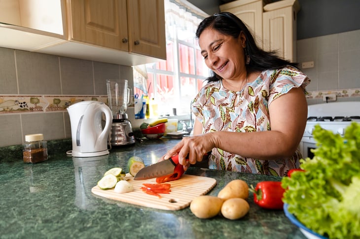 woman chopping vegetables veggies