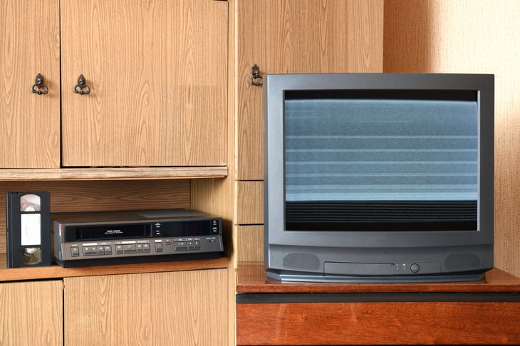 1980s vhs video tape player and TV
