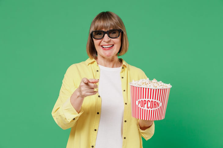 older woman with popcorn