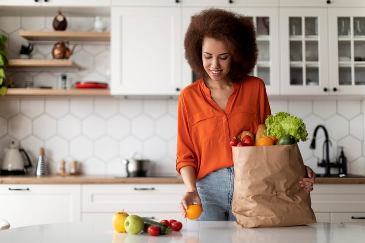 woman unpacking groceries