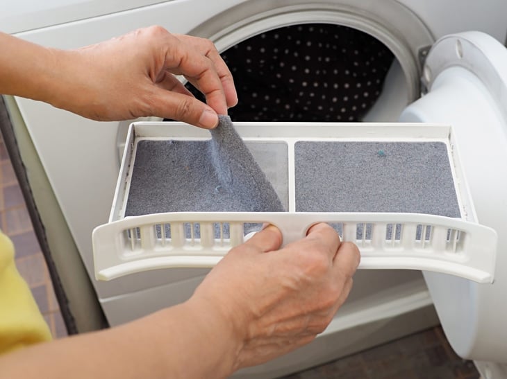Removing lint from dryer filter