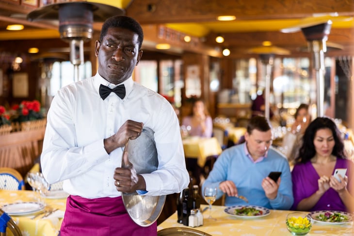 Unhappy waiter