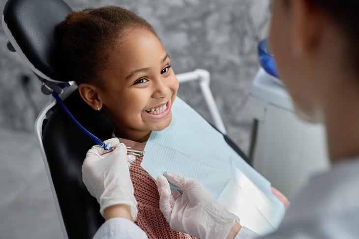 Young girl at the dentist