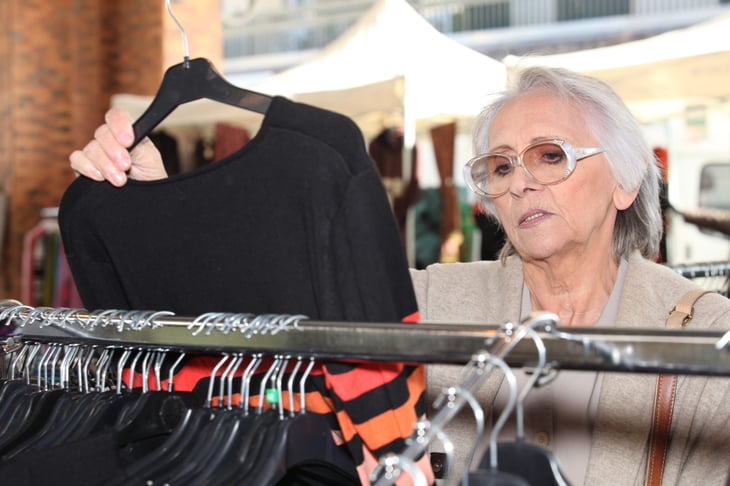 Senior woman shopping for clothing