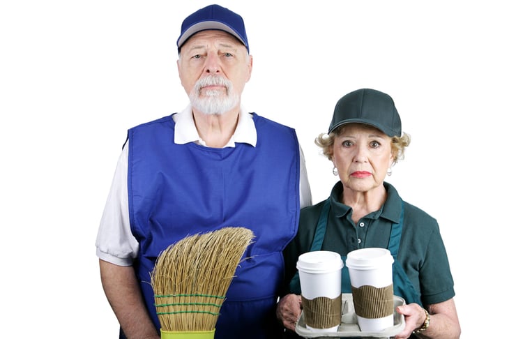 Unhappy senior couple working