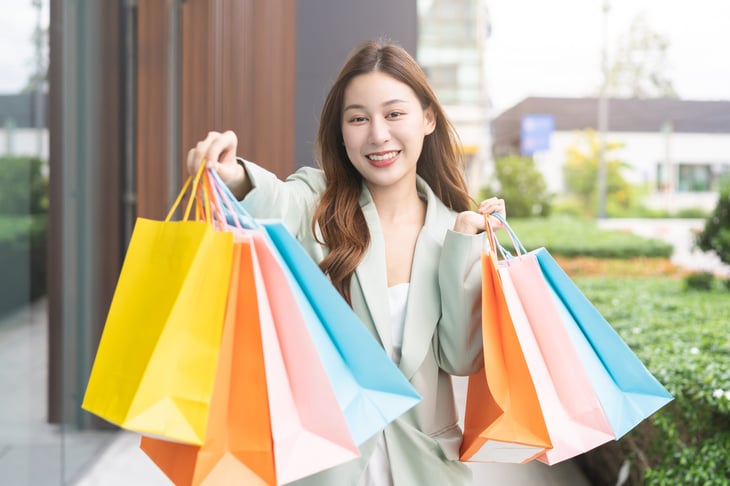Excited woman who is shopping