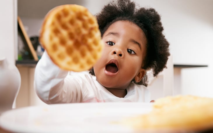Little girl with waffle