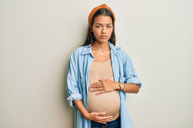 Serious pregnant woman