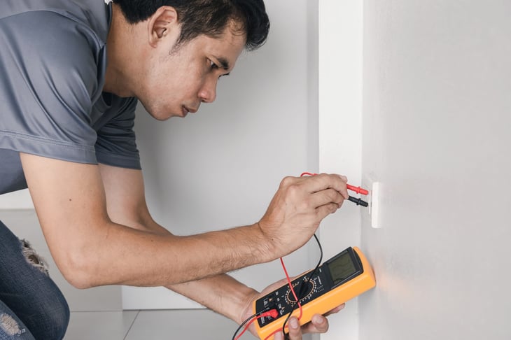 Electrician conducts a home inspection