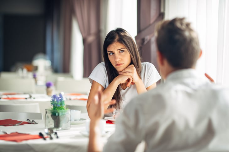 Woman doubting whether a man, is telling the truth or lying