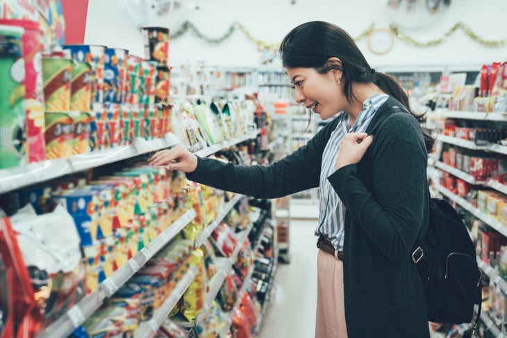 Woman shopping in a convenience store
