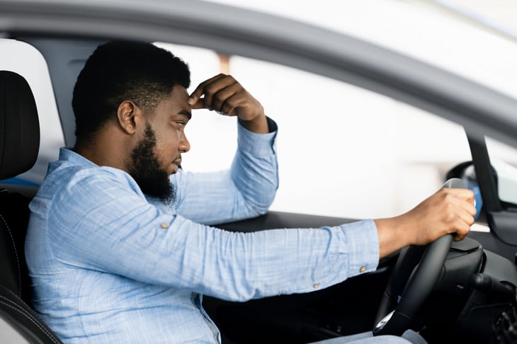 Unhappy driver behind the wheel