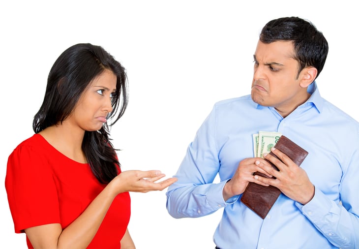 Man refusing to share money with his girlfriend or wife because he is a cheapskate