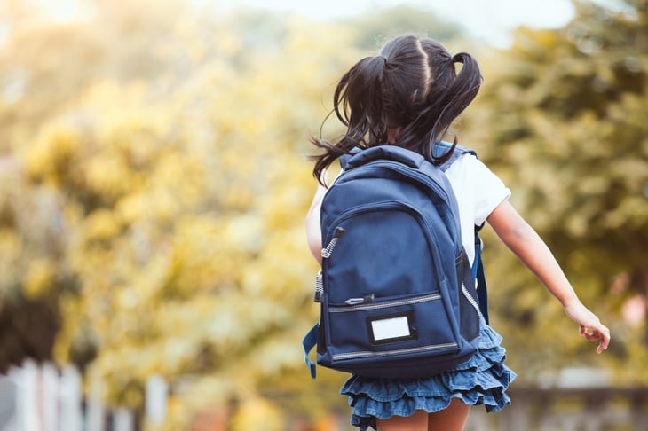 Little girl with backpack