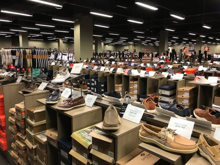 Shoes and shoeboxes in a DSW retail store