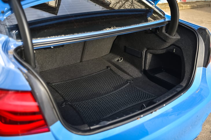 Open car trunk with storage solutions