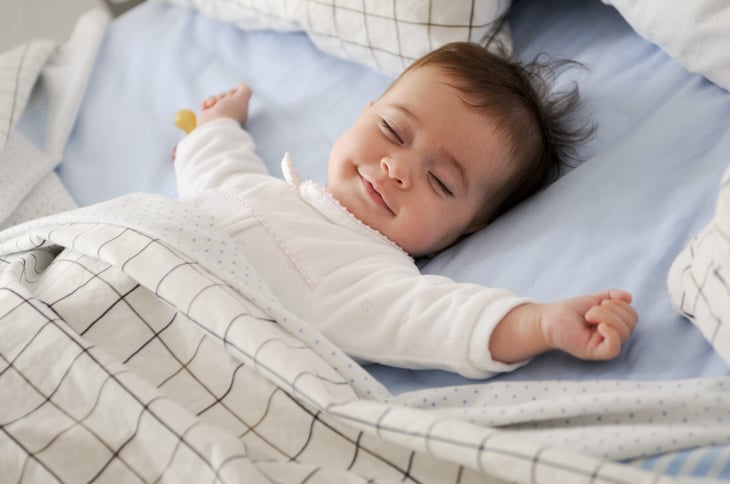 Happy baby sleeping