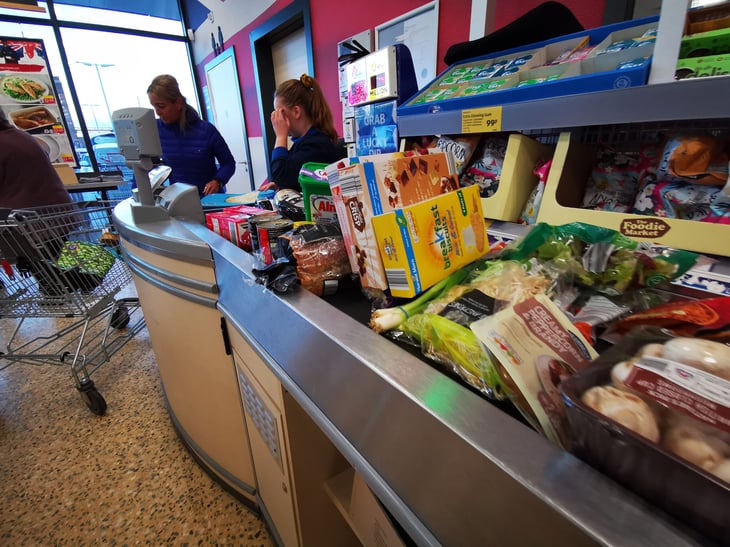 Aldi checkout line with a cashier