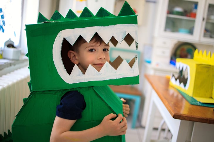Child in cardboard costume