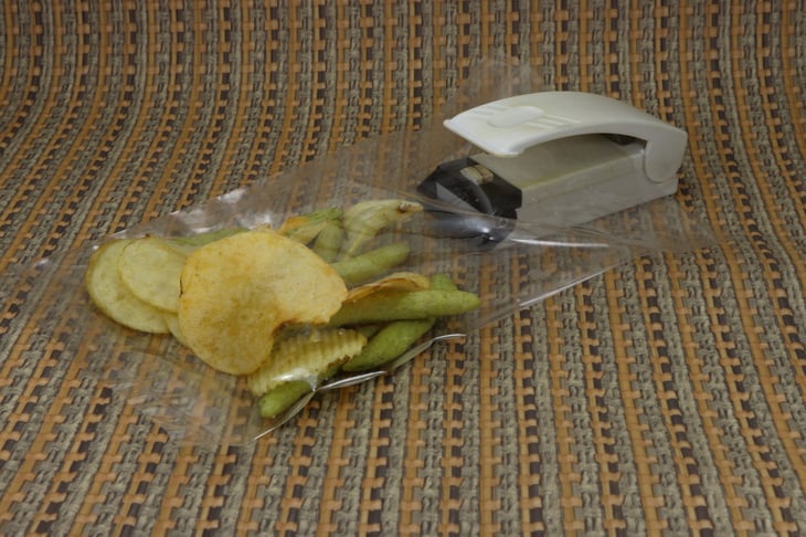 Electric sealer (Food preservation) for plastic bag mouth sealing.