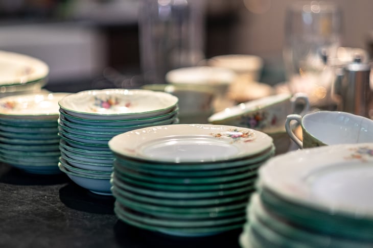 Stacks of vintage and antique dishes